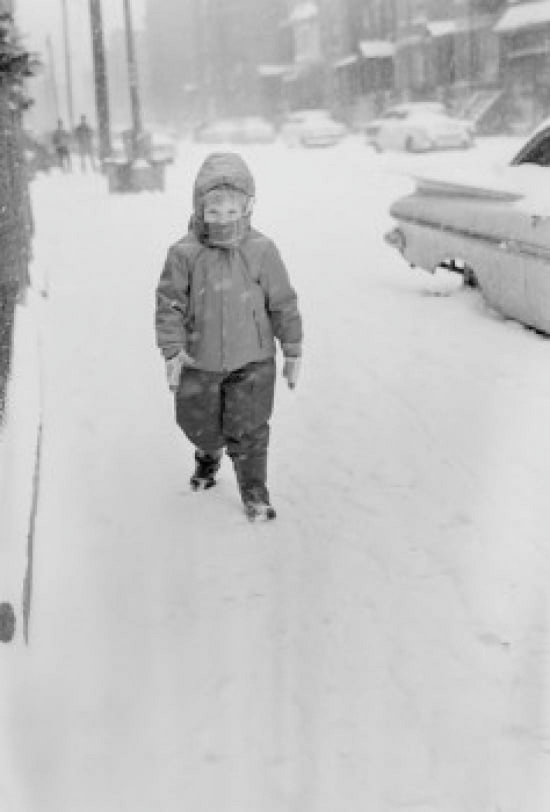 Little girl walking in snow storm Canvas Art - (18 x 24)