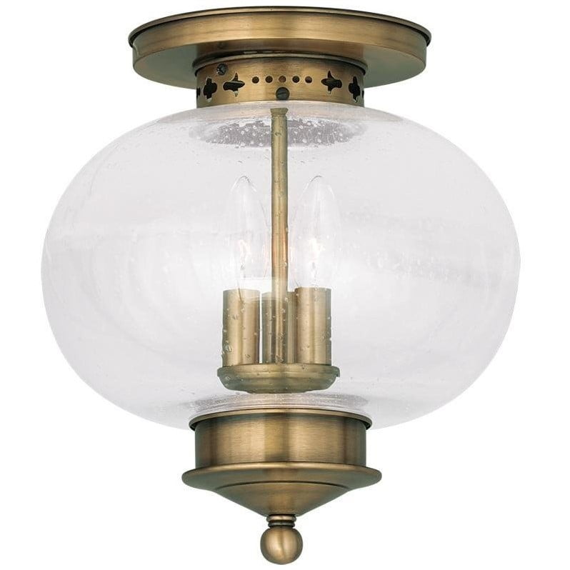 Harbor Antique Brass Globe LED Flush Mount with Hand Blown Seeded Glass
