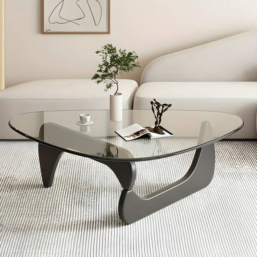 Living Room Coffee Table - A Triangular Glass Coffee Table With A ...