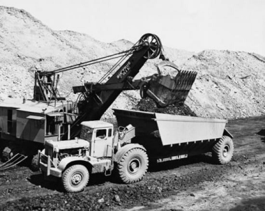Loading coal in a dump truck in a mining operation Canvas Art - (24 x 36)