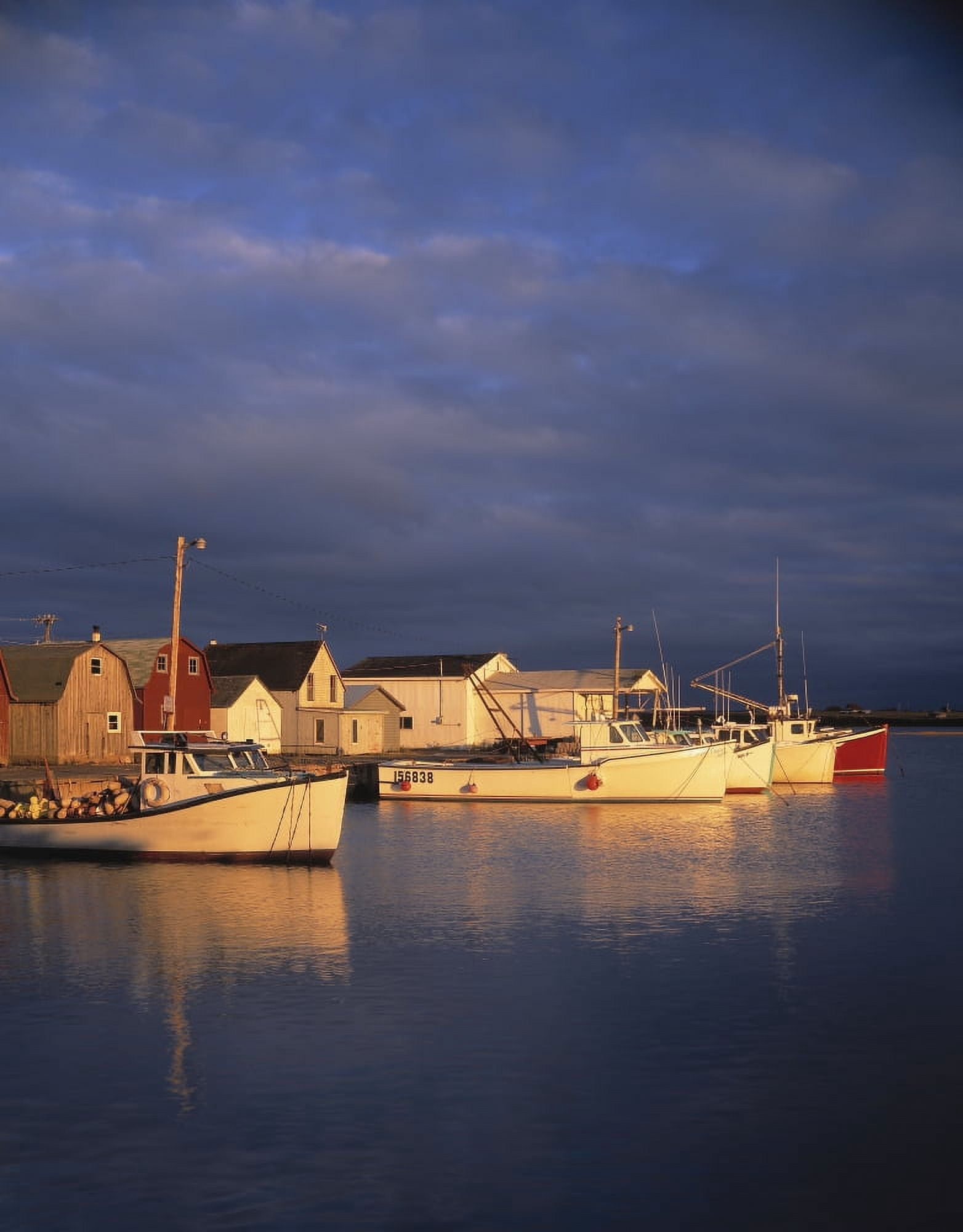 Lobster boats tied up on Prince Edward Island in the evening light Canada Canvas Art - Panoramic Images (9 x 27)
