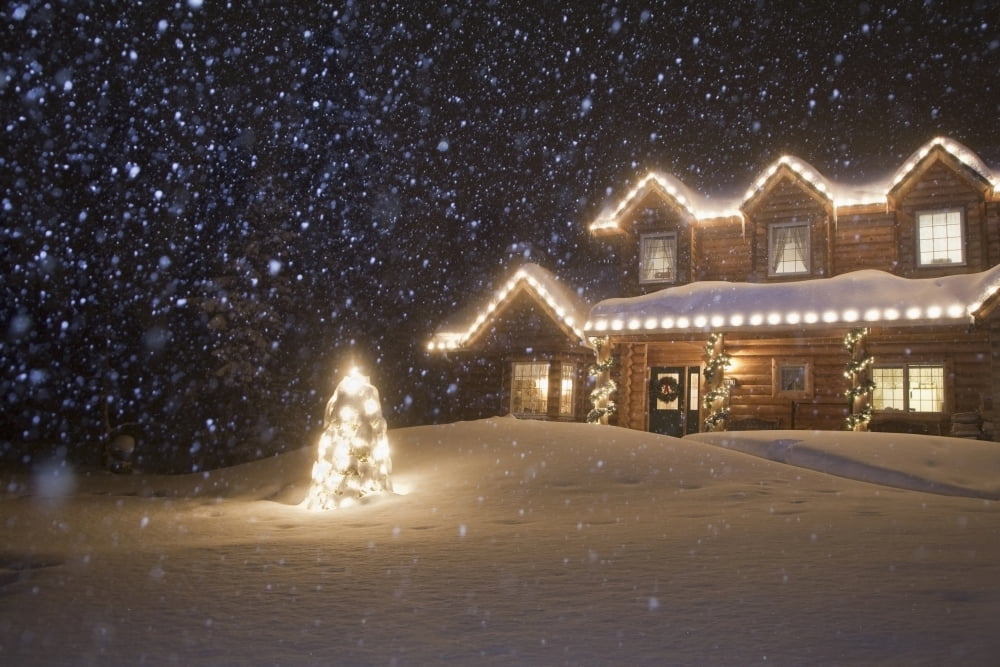 Log Home Decorated With Christmas Lights With Snow Falling Overhead Anchorage Southcentral Alaska Canvas Art - Jeff Schultz Design Pics (34 x 22)