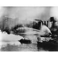 thumbnail image 1 of London Firemen Direct Water From Their Fireboats Onto Blazing Warehouse. The Germans Bombed The Port Facilities On The, 1 of 1