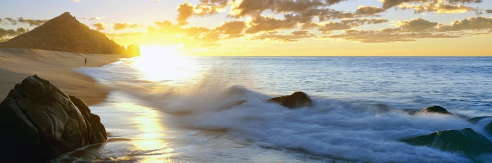 Lonely fisherman on beach at sunrise Lands End Baja California Sur Mexico Canvas Art - Panoramic Images (27 x 9)