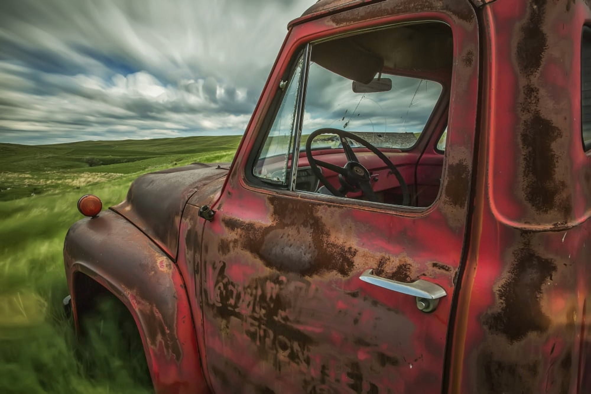 Long exposure of clouds drifting by over an abandoned truck in a rural area Saskatchewan Canada Canvas Art - Robert Postma Design Pics (38 x 24)