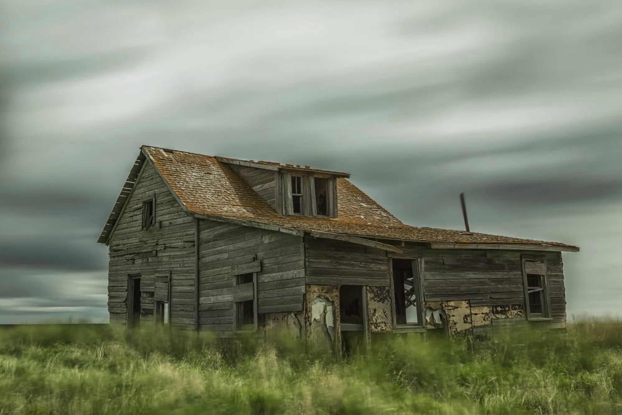 Long exposure of clouds going over an abandoned house Val Marie Saskatchewan Canada Canvas Art - Robert Postma Design Pics (38 x 24)