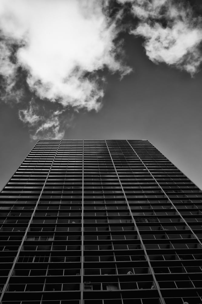 Looking up at a tall building in Waikiki processed in high contrast black and white Honolulu Oahu Hawaii United States of America Canvas Art - Ian Ludwig Design Pics (12 x 19)