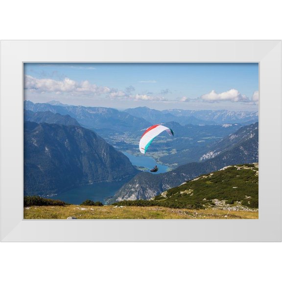 Looney, Hollice 14x11 White Modern Wood Framed Museum Art Print Titled - Austria-Dachstein-Paraglider soaring above Lake Hallstatt and the surrounding mountains