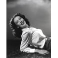 thumbnail image 1 of Loretta Young posed Curly Hair Lying with a White Long Sleeves and Black Skirts Photo Print (24 x 30), 1 of 1