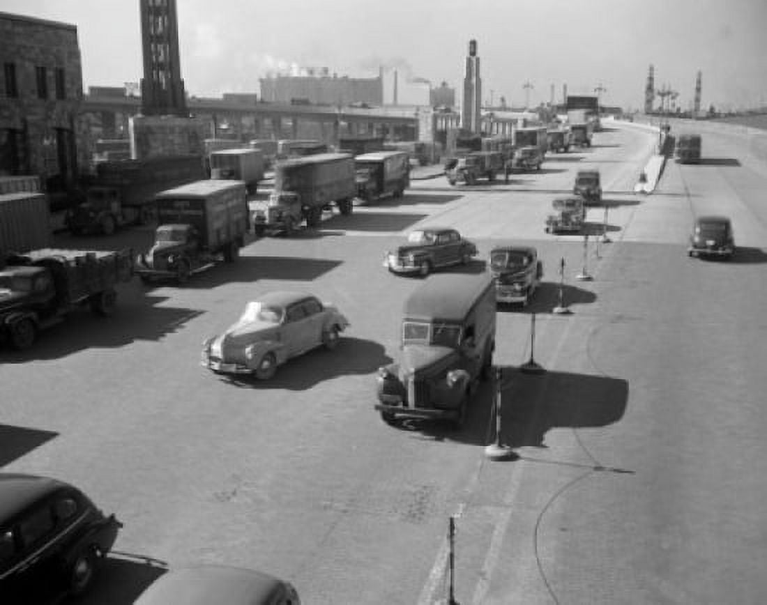 Lorries queuing near industrial building high angle view Canvas Art - (24 x 36)