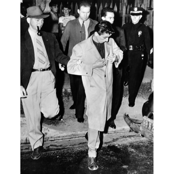 Los Angeles Police Take A Zoot Suiter Into Custody. Man Wearing A Super-Knee Length Zoot Suit With Stuff Cuffs On The