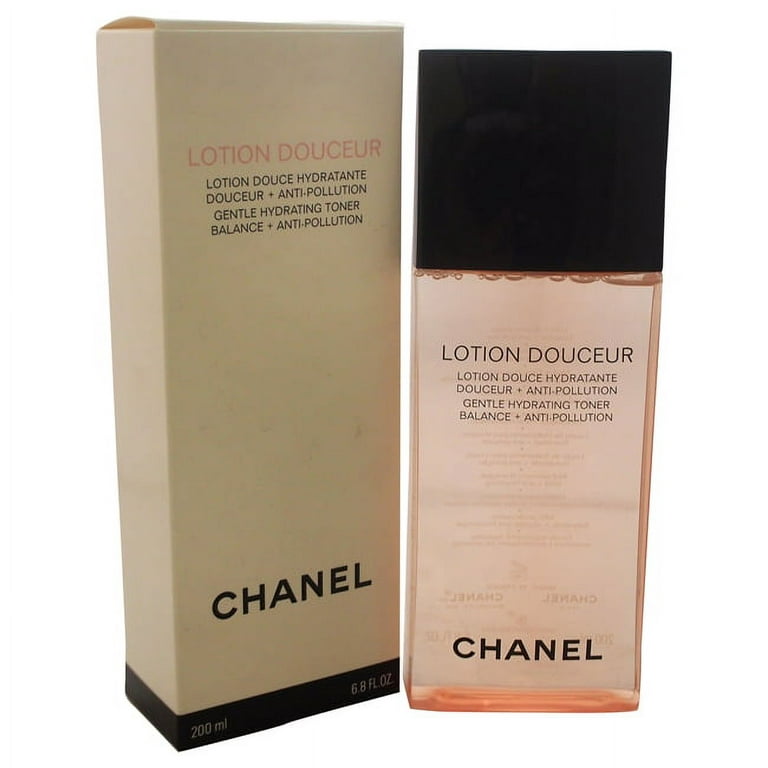 A bottle of Chanel Lotion Douceur toner on a white background