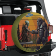 thumbnail image 1 of Lotusprinthandmade Funny Bigfoot Let's Mess With Humans Spare Tire Cover With Backup Camera Hole 6 Sizes (28 in.), bigfoot-themed spare cover, 1 of 7
