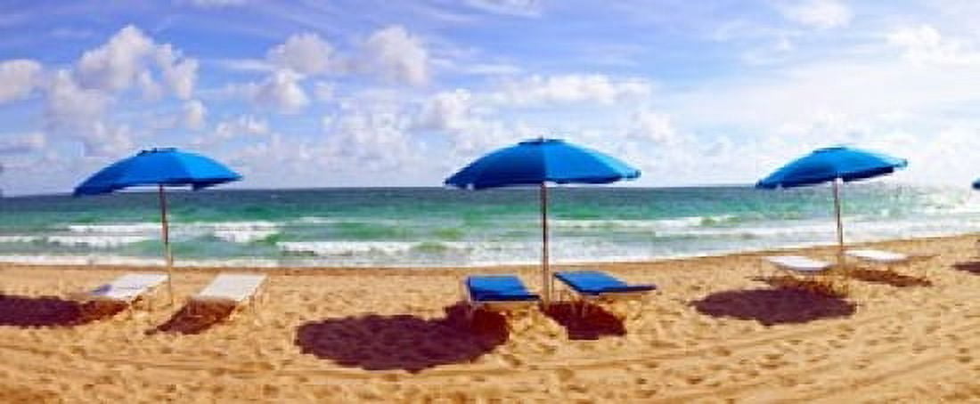Lounge chairs and beach umbrellas on the beach Fort Lauderdale Beach Florida USA Canvas Art - Panoramic Images (15 x 6)