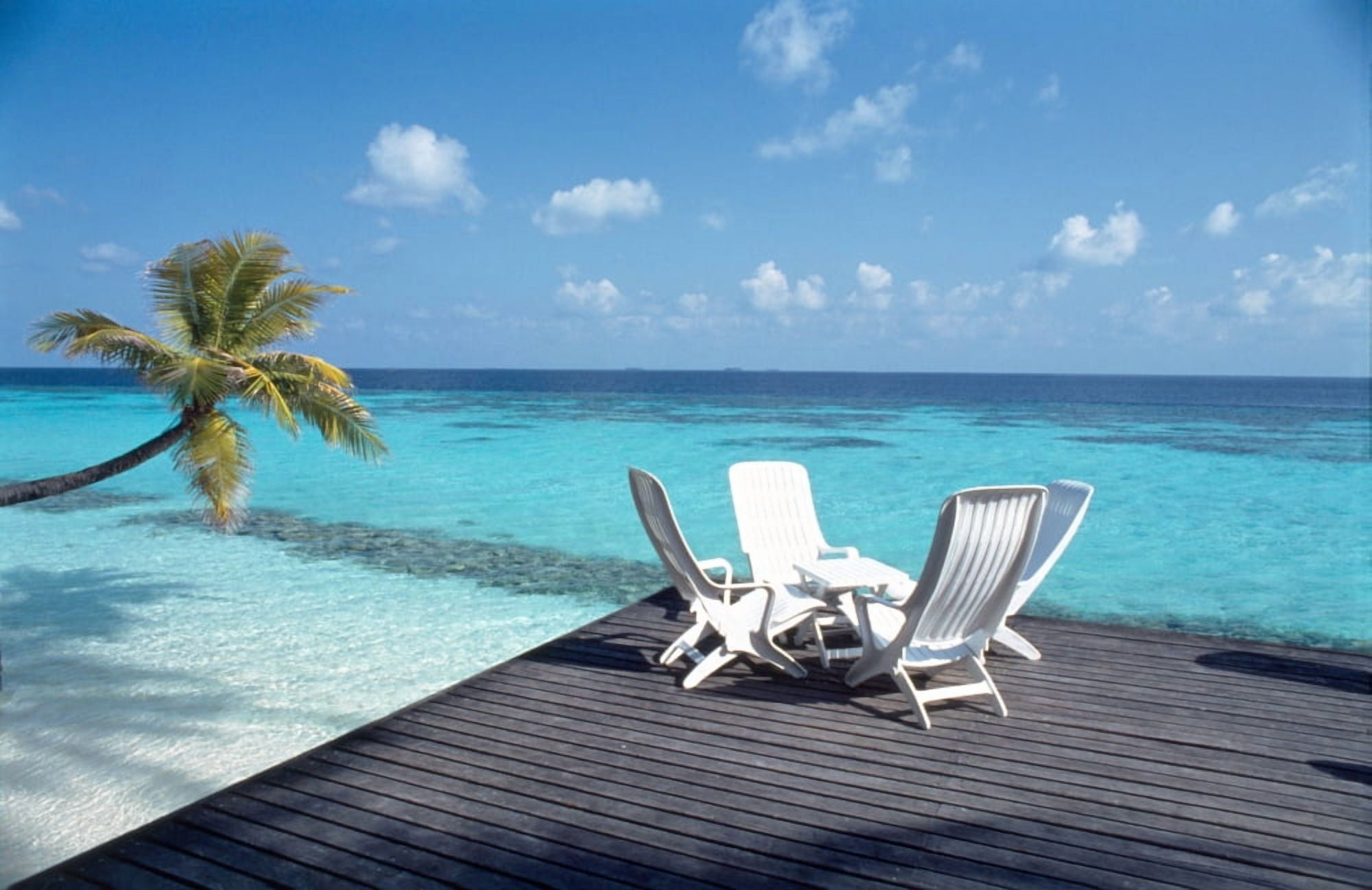 Lounge chairs on the beach Canvas Art - Panoramic Images (27 x 9)