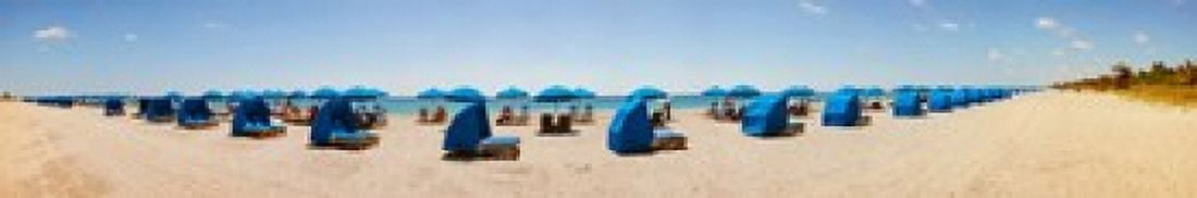 Lounge chairs on the beach Delray Beach Palm Beach County Florida USA Canvas Art - Panoramic Images (22 x 4)