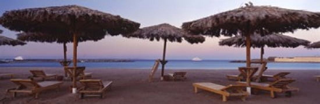 Lounge chairs with sunshades on the beach Hilton Resort Hurghada Egypt Canvas Art - Panoramic Images (18 x 6)