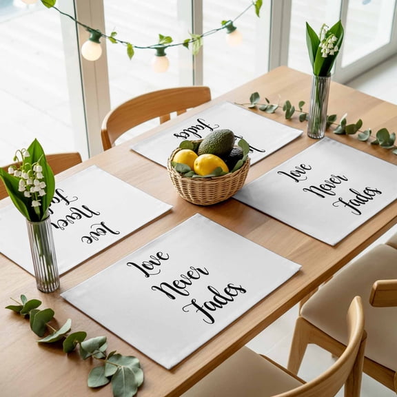 Love Never Fades Quote Black White Placemats Set of 4,Wipeable Washable Table Mats for Dining Tables, Simple Abstract Text Place Mats for Kitchen Event Party Tabletop Decor