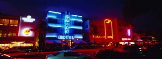 Low Angle View Of A Hotel Lit Up At Night Miami Florida USA Canvas Art - Panoramic Images (36 x 13)