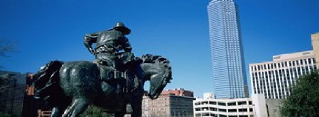 Low Angle View Of A Statue In Front Of Buildings Dallas Texas USA Canvas Art - Panoramic Images (18 x 7)