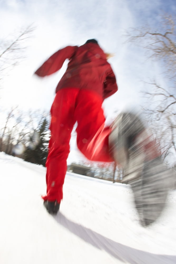 Low Angle View Of A Young Woman Jogging In Winter Princes Island Park Calgary Alberta Canvas Art - Gemstone Images Design Pics (12 x 18)