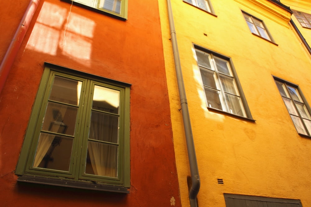Low Angle View Of Red And Yellow Painted Buildings Stockholm Sweden Canvas Art - Trish Punch Design Pics (38 x 24)