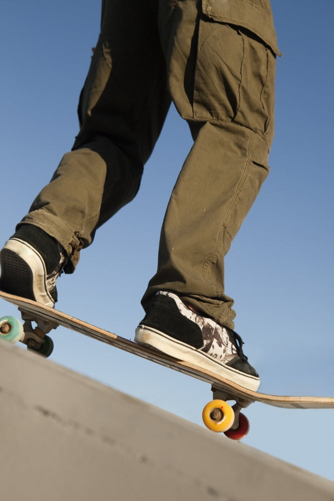 Low Angle View Of Young Male Skateboarder Canvas Art - Marcos Welsh Design Pics (24 x 38)