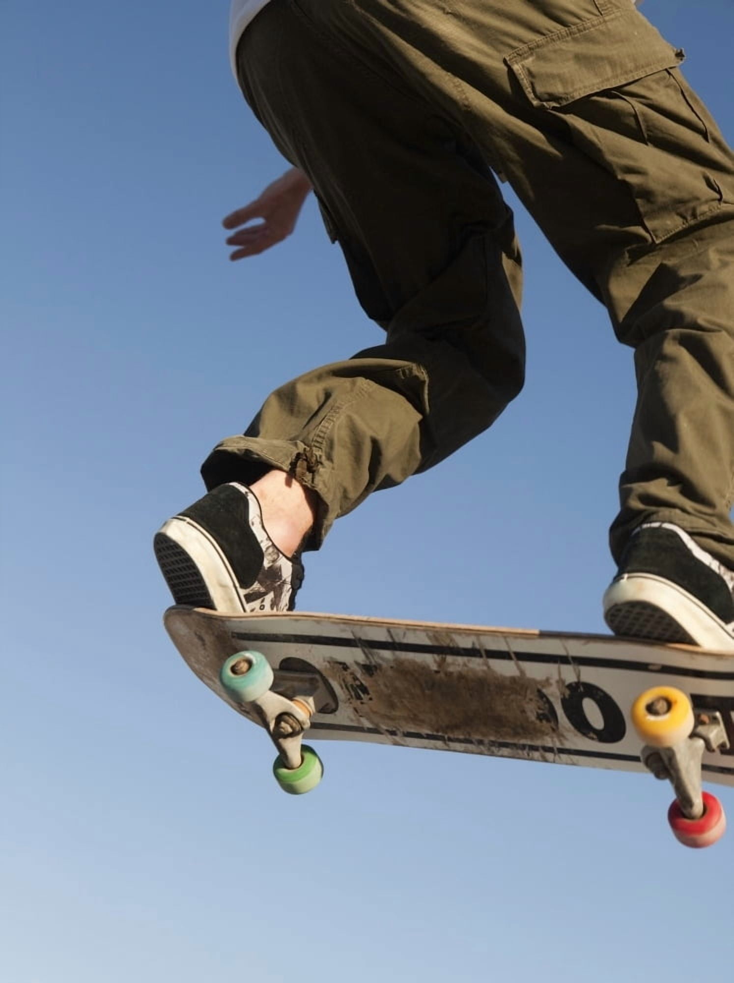 Low Angle View Of Young Male Skateboarder Canvas Art - Marcos Welsh Design Pics (28 x 38)