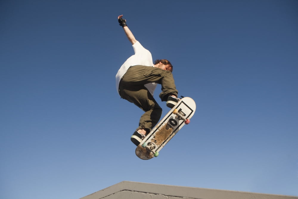 Low Angle View Of Young Male Skateboarder Canvas Art - Marcos Welsh Design Pics (36 x 24)