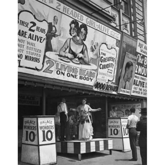 Low Angle View of a Sideshow Billboard Poster Print - 18 x 24 in.