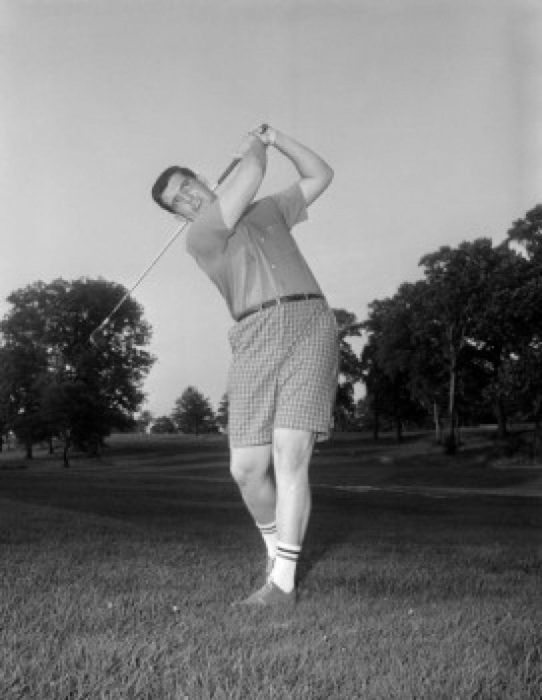 Low-angel view of man playing golf Canvas Art -  (24 x 36)