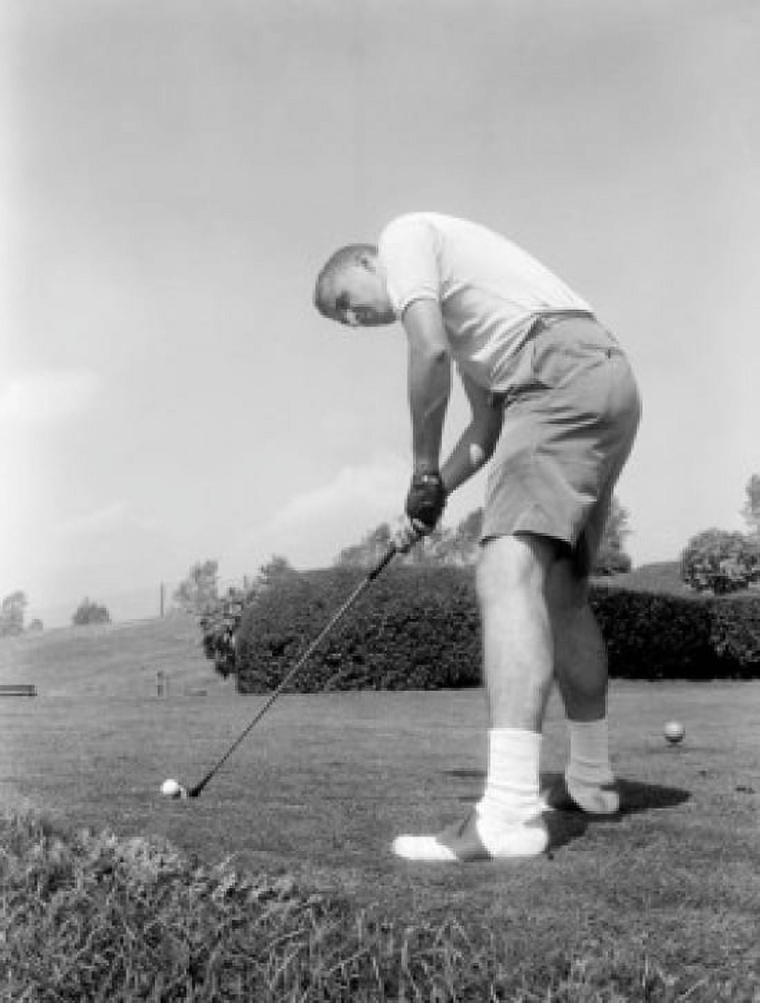 Low-angel view of man playing golf Canvas Art - (24 x 36)