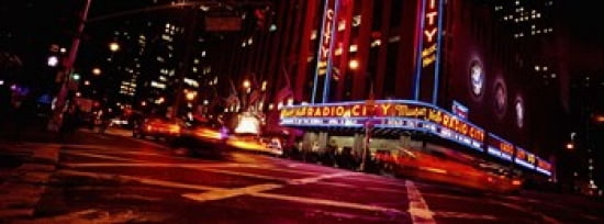 Low angle view of buildings at night Radio City Music Hall Rockefeller Center Manhattan New York City New York State USA Canvas Art - Panoramic Images (36 x 13)