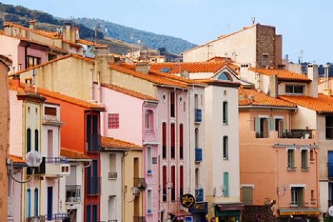 Low angle view of buildings in a town Collioure Vermillion Coast Pyrennes-Orientales Languedoc-Roussillon France Canvas Art - Panoramic Images (36 x 24)