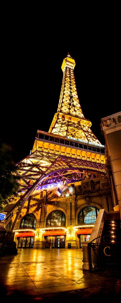 Low angle view of illuminated restaurant Las Vegas Replica Eiffel Tower Paris Las Vegas Las Vegas Clark County Nevada USA Canvas Art - Panoramic Images (12 x 30)