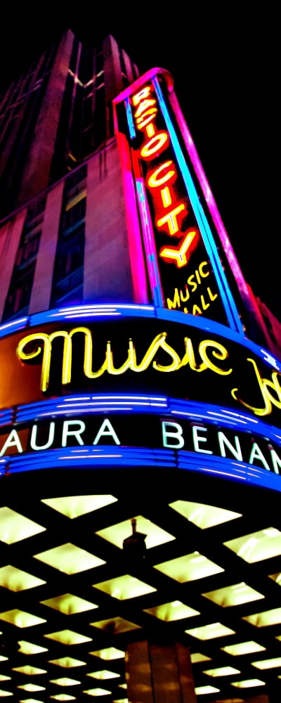 Low angle view of neon sign on Radio City Music Hall Rockefeller Center Manhattan New York City New York State USA Canvas Art - Panoramic Images (6 x 15)