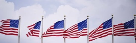 Low angle view of American flags fluttering in wind Canvas Art - Panoramic Images (36 x 12)