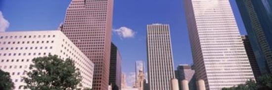 Low angle view of Downtown skylines Houston Texas USA Canvas Art - Panoramic Images (36 x 12)