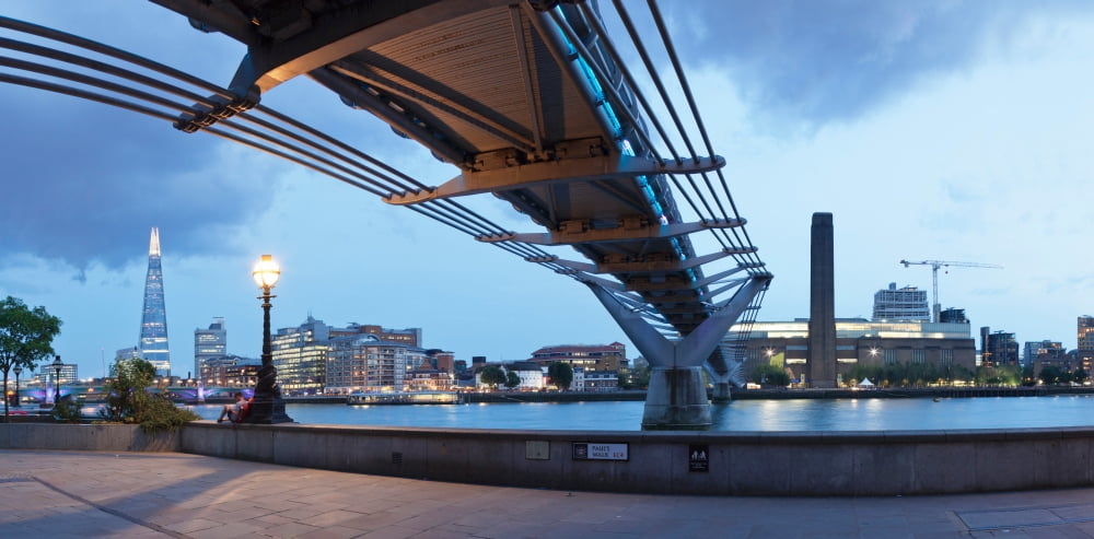 Low angle view of Millennium Bridge Thames River Southwark London England Canvas Art - Panoramic Images (27 x 9)