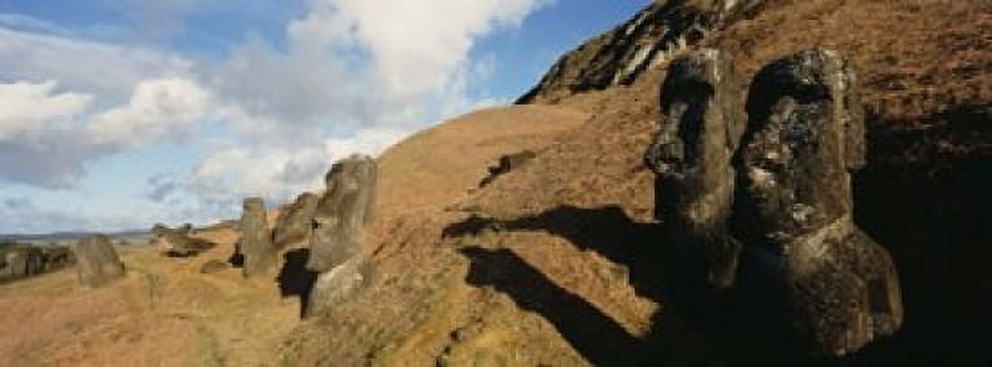 Low angle view of Moai statues Tahai Archaeological Site Rano Raraku Easter Island Chile Canvas Art - Panoramic Images (15 x 6)