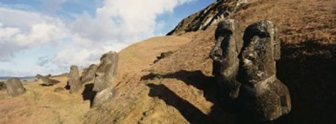 Low angle view of Moai statues Tahai Archaeological Site Rano Raraku Easter Island Chile Canvas Art - Panoramic Images (15 x 6)