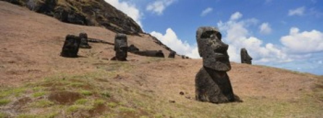 Low angle view of Moai statues Tahai Archaeological Site Rano Raraku Easter Island Chile Canvas Art - Panoramic Images (18 x 7)