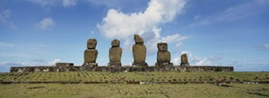 Low angle view of Moai statues in a row Tahai Archaeological Site Rano Raraku Easter Island Chile Canvas Art - Panoramic Images (36 x 13)