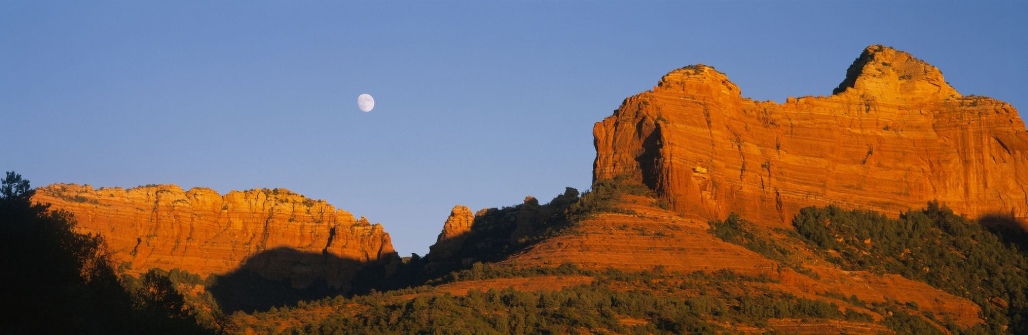 Low angle view of Moon over red rocks Sedona Arizona USA Canvas Art - Panoramic Images (27 x 9)