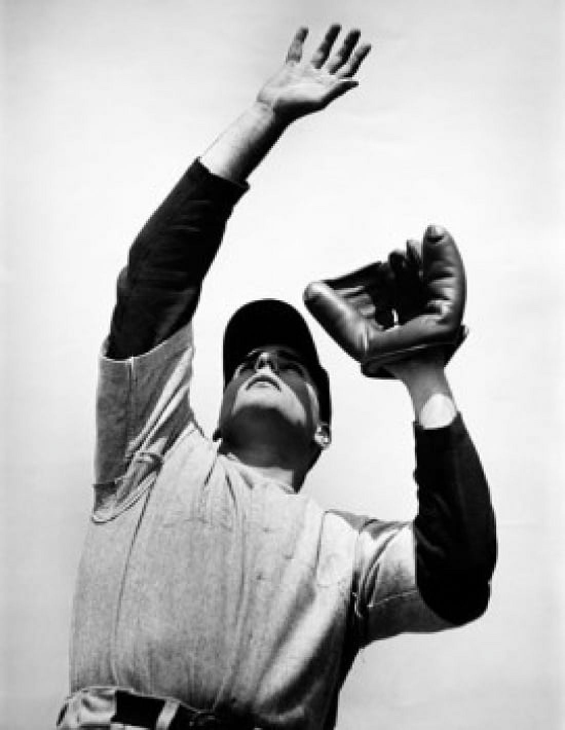 Low angle view of a baseball player catching a ball Canvas Art - (24 x 36)