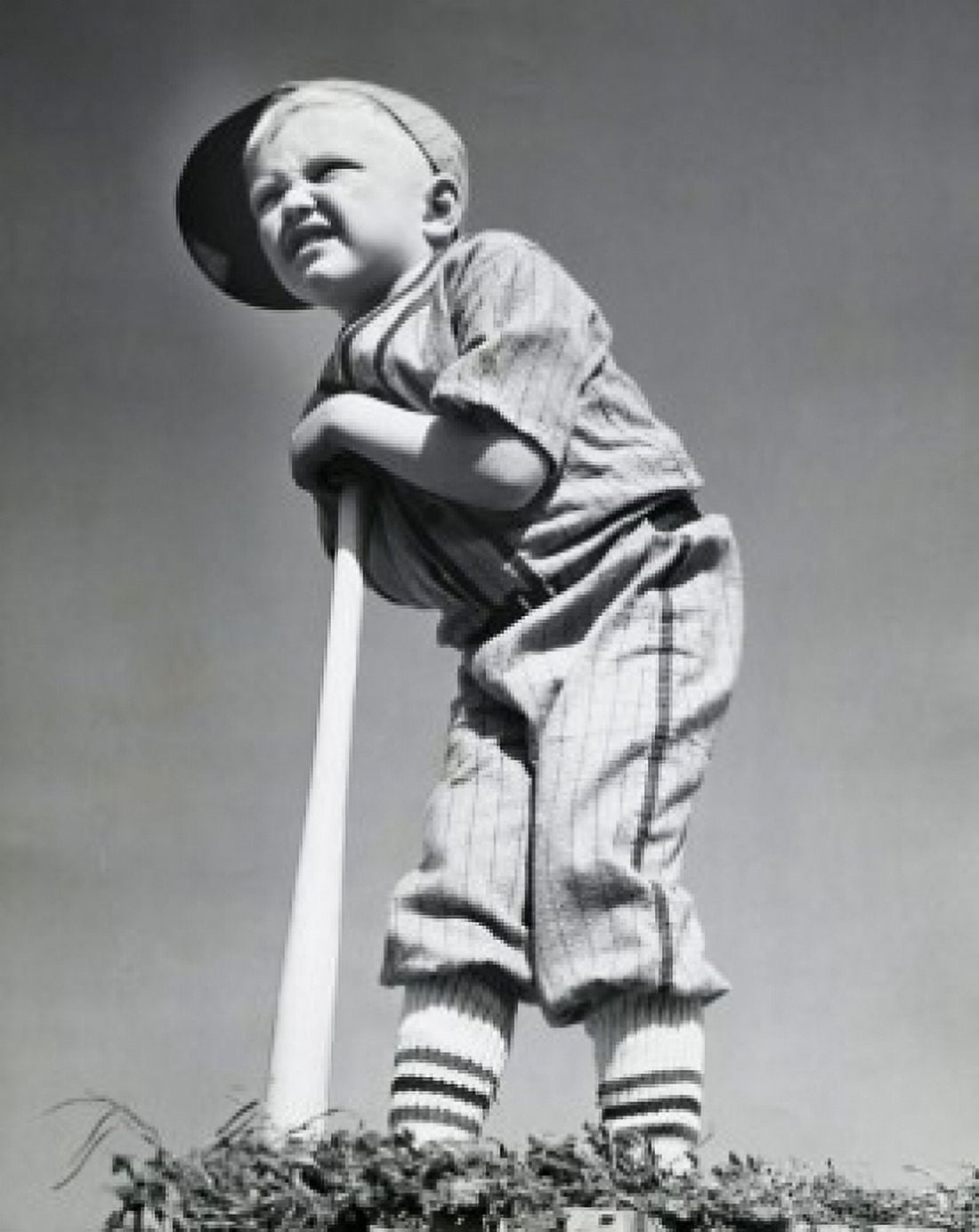 Low angle view of a boy leaning on a baseball bat Canvas Art - (18 x 24)
