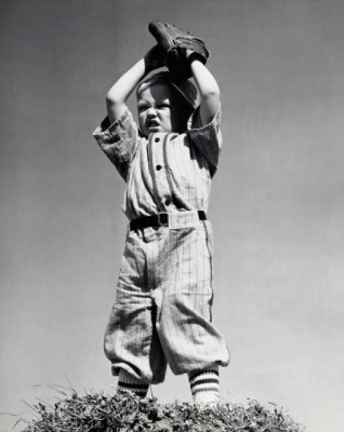 Low angle view of a boy playing baseball Canvas Art - (24 x 36)