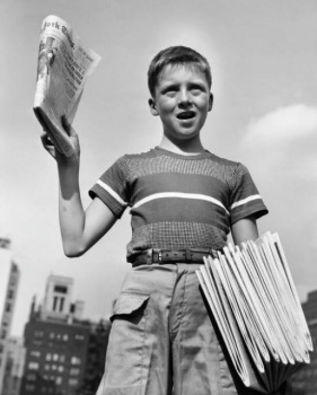 Low angle view of a boy selling newspapers Canvas Art - (18 x 24)
