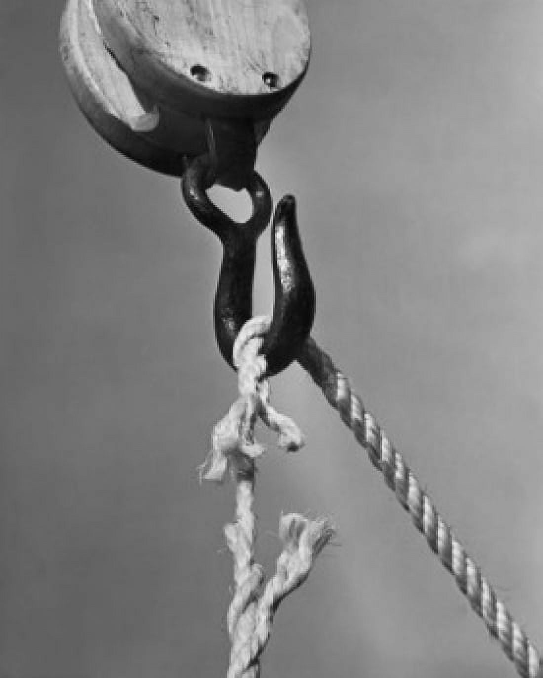 Low angle view of a breaking rope hanging on a hook Canvas Art - (24 x 36)