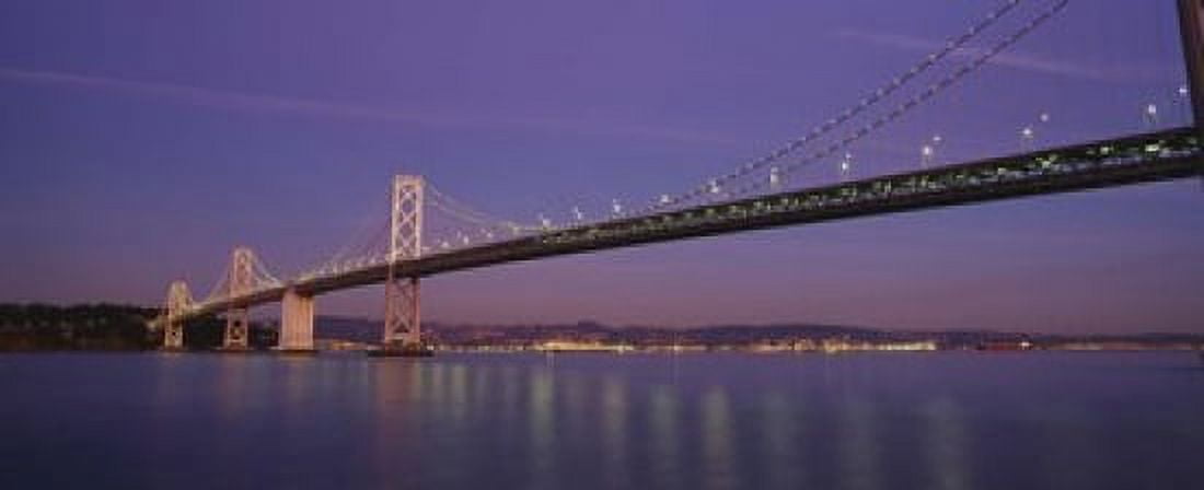 Low angle view of a bridge at dusk Oakland Bay Bridge San Francisco California USA Canvas Art - Panoramic Images (15 x 6)